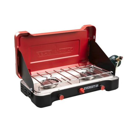 The Everest 2X Camp Stove by Camp Chef is a red and black camp stove with two burners, perfect for outdoor cooking.
