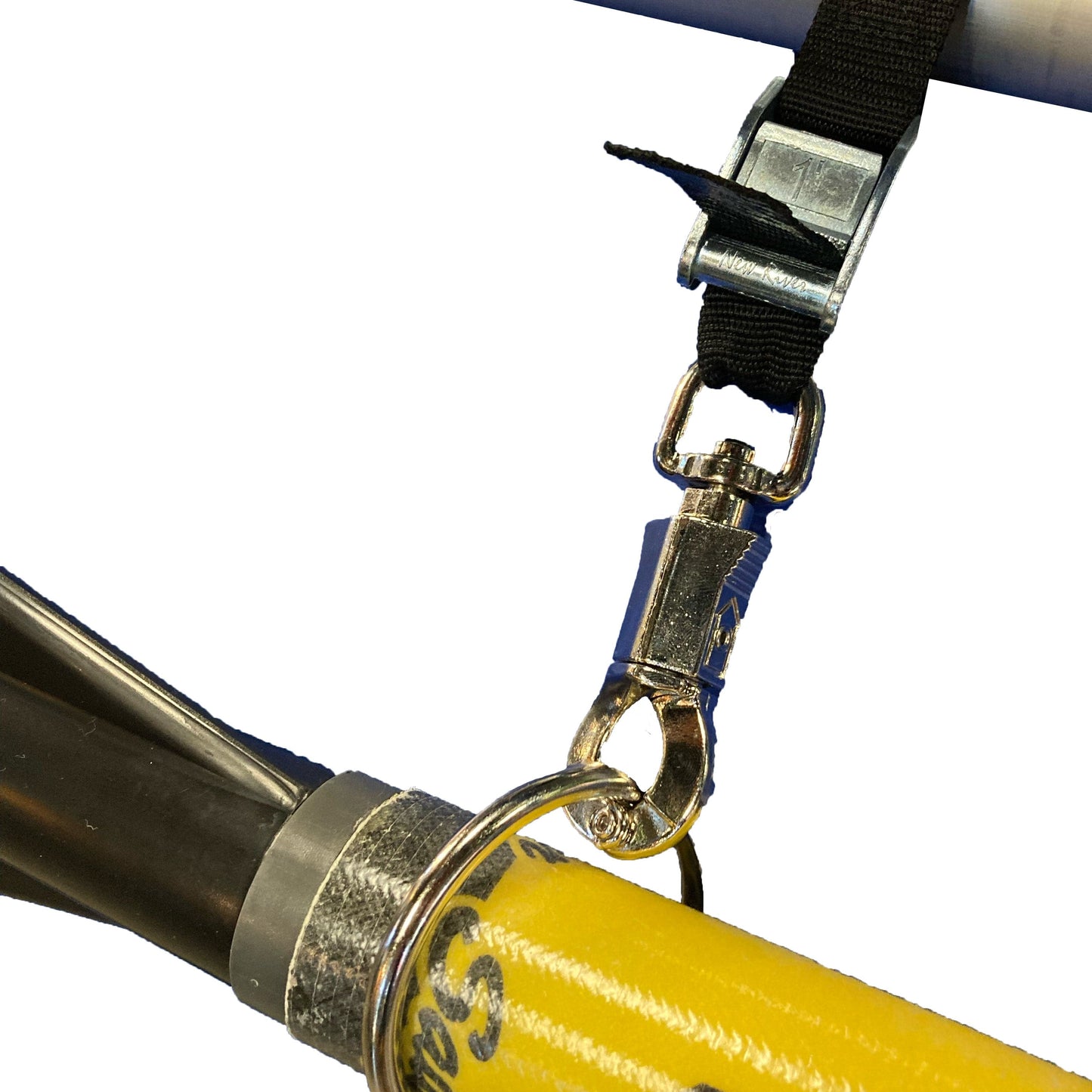 Close-up of a Spare Oar Keeper by Coyote River Gear: a yellow hose connected to a silver pipe, secured with a black strap and metal clip using a sturdy cam strap.