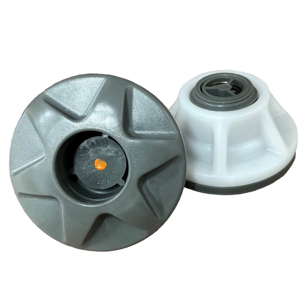 A pair of Leafield A6 Pressure Relief Valves - 3.25 psi on a white surface, commonly found on AIRE boats.