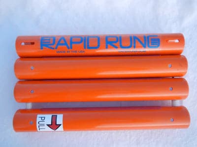 A group of orange tubes with the word Rapid Rung on them.