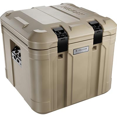 The Pelican TX50 Adventure Case is a tan hard-shell cooler with black latches and metal handles, shown closed from the front—providing rugged protection for your outdoor adventures.