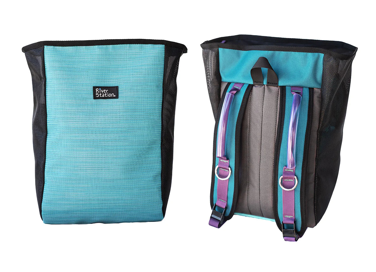 Front and back views of a blue and black Thwart Bag for hikes with mesh details, adjustable straps, and a durable YKK zipper from River Station Gear.