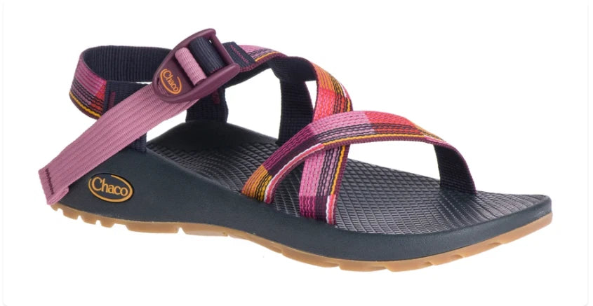 The Chaco Z1 Classic - Women's sandal features a black sole, textured footbed, and adjustable pink, purple, and orange webbing straps with buckle—stylish and limited edition, perfect for hiking.