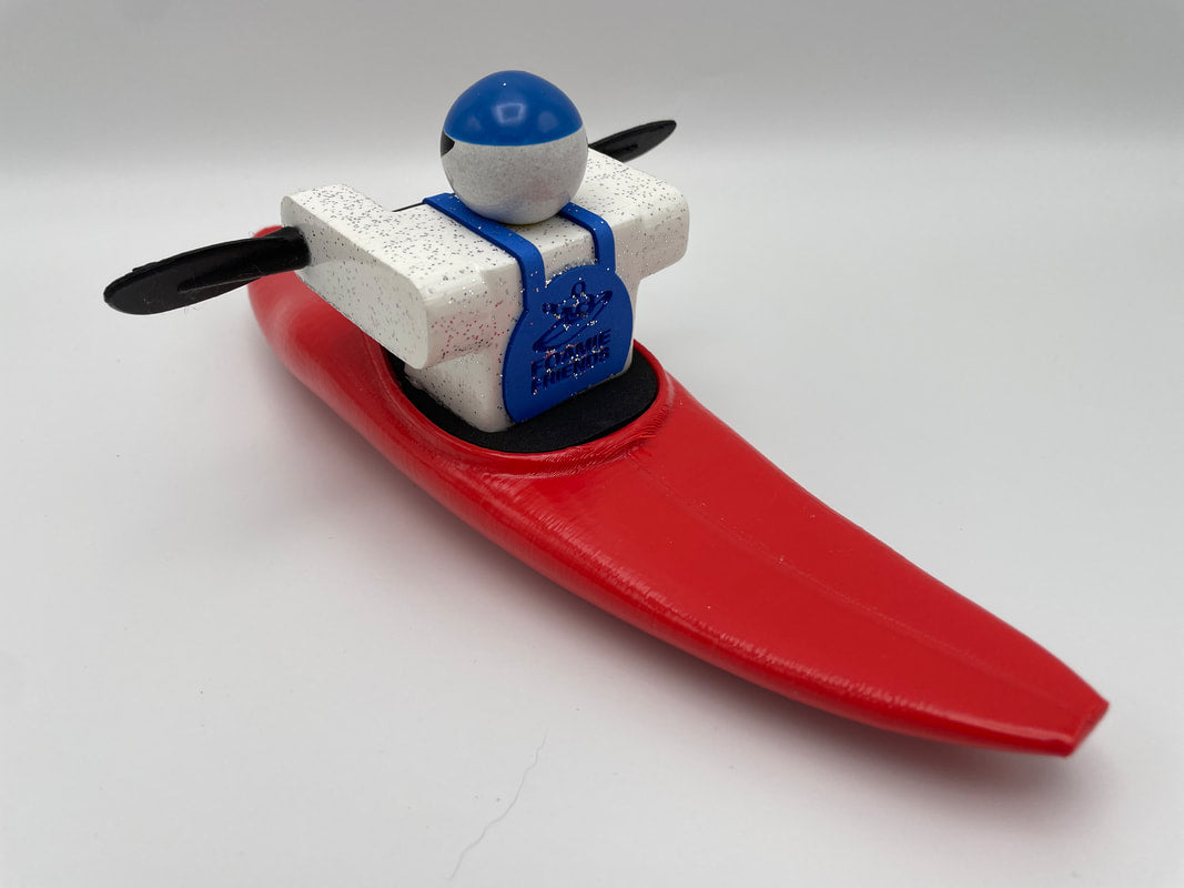 The Foamie Friends Foamie Half-Slice toy figure expertly captures the thrill of river play while navigating in a red kayak, complete with a blue helmet and paddle, embodying the essence of water dynamics.