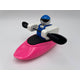 Discover the adventurous Foamie Friends toy figure, primed to conquer river dynamics in their Foamie Spud Play Boat. Equipped with a blue helmet and black paddles, this explorer is all set for thrilling journeys in a vibrant pink kayak.