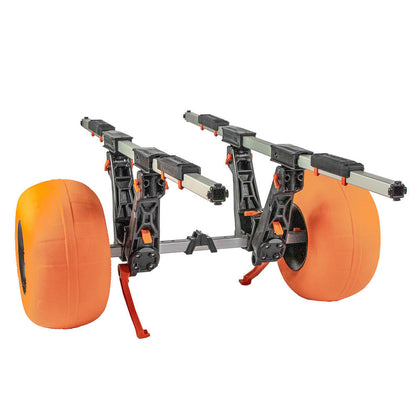 The YakAttack TowNStow BarCart Kayak Cart with Sand Tires features a universal fit and an adjustable black and silver metal frame for easy kayak transport over sand or uneven terrain.