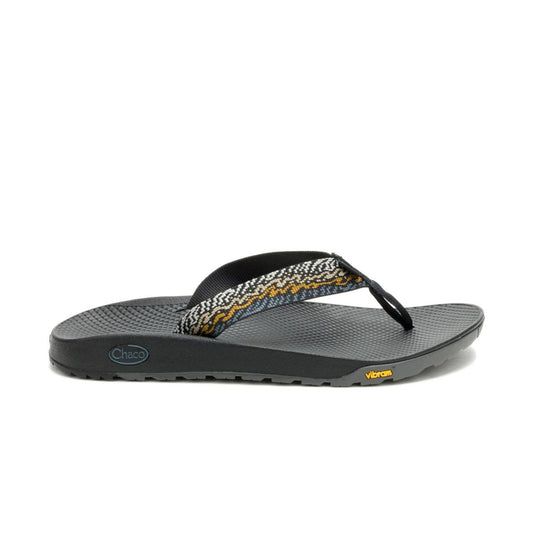 The Chaco Rapid Pro Flip Flop - Mens is a black and gray sandal with patterned straps, a textured sole, and Vibram outsole for excellent grip. Features Chaco and Vibram logos; designed for water performance.