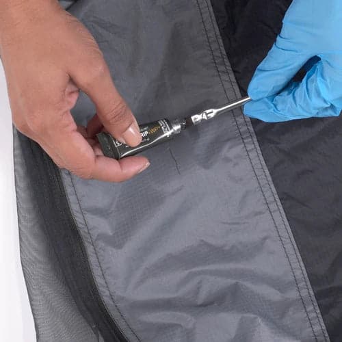 Featuring the Seam Grip+WP Repair Kit field repair, river wing repair, seam repair, tent repair manufactured by Gear Aid shown here from a third angle.