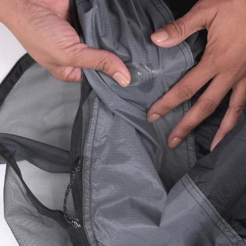 Featuring the Seam Grip+WP Repair Kit field repair, river wing repair, seam repair, tent repair manufactured by Gear Aid shown here from a fourth angle.