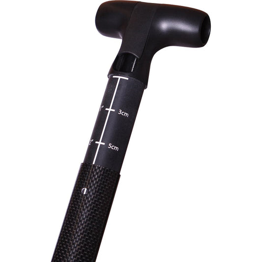 The Werner Paddles Trance 95 - Travel SUP Paddle features a close-up of its black carbon fiber handle with a measurement scale on the shaft, evoking the look of a lightweight performance paddle.