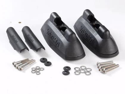 a pair of Yakima Landing Pads with screws and bolts.