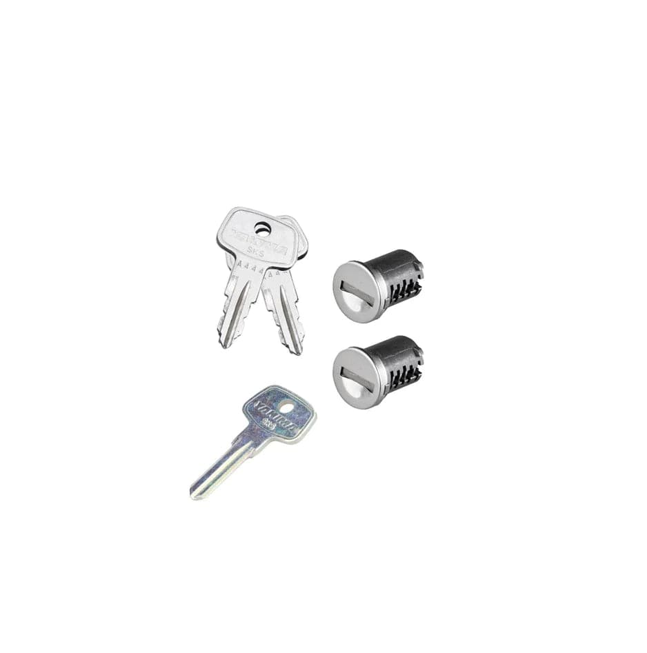 a set of SKS Lock Cores by Yakima and a lock on a white background.