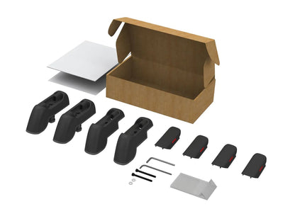 a black Yakima Landing Pads with a set of tools and a Yakima box.