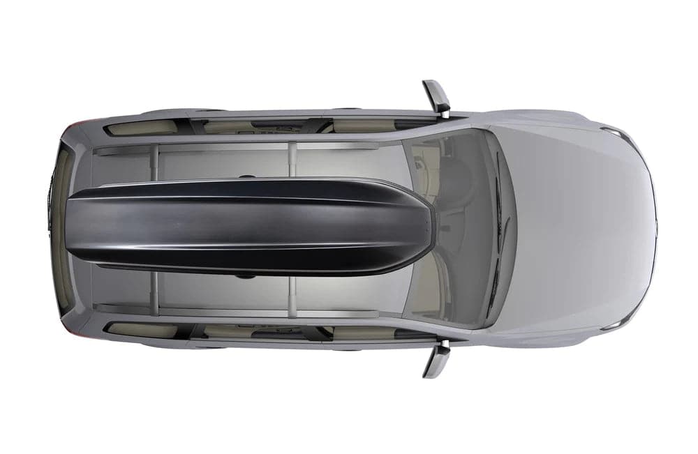 Featuring the Skybox 12 Carbonite cargo box, storage manufactured by Yakima shown here from a second angle.