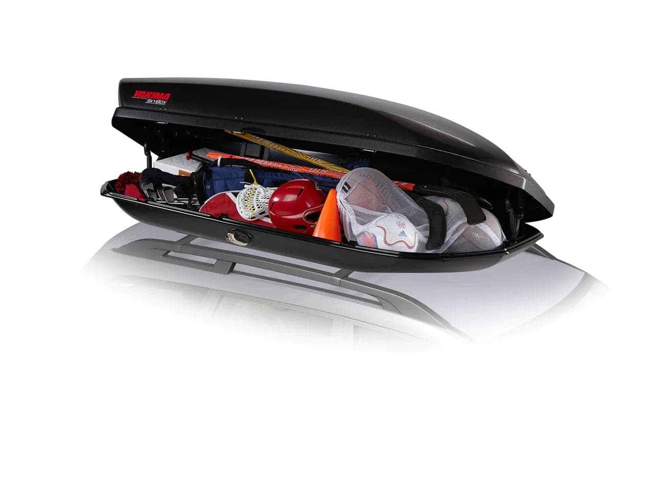 Featuring the Skybox 18 Carbonite cargo box, storage manufactured by Yakima shown here from a third angle.