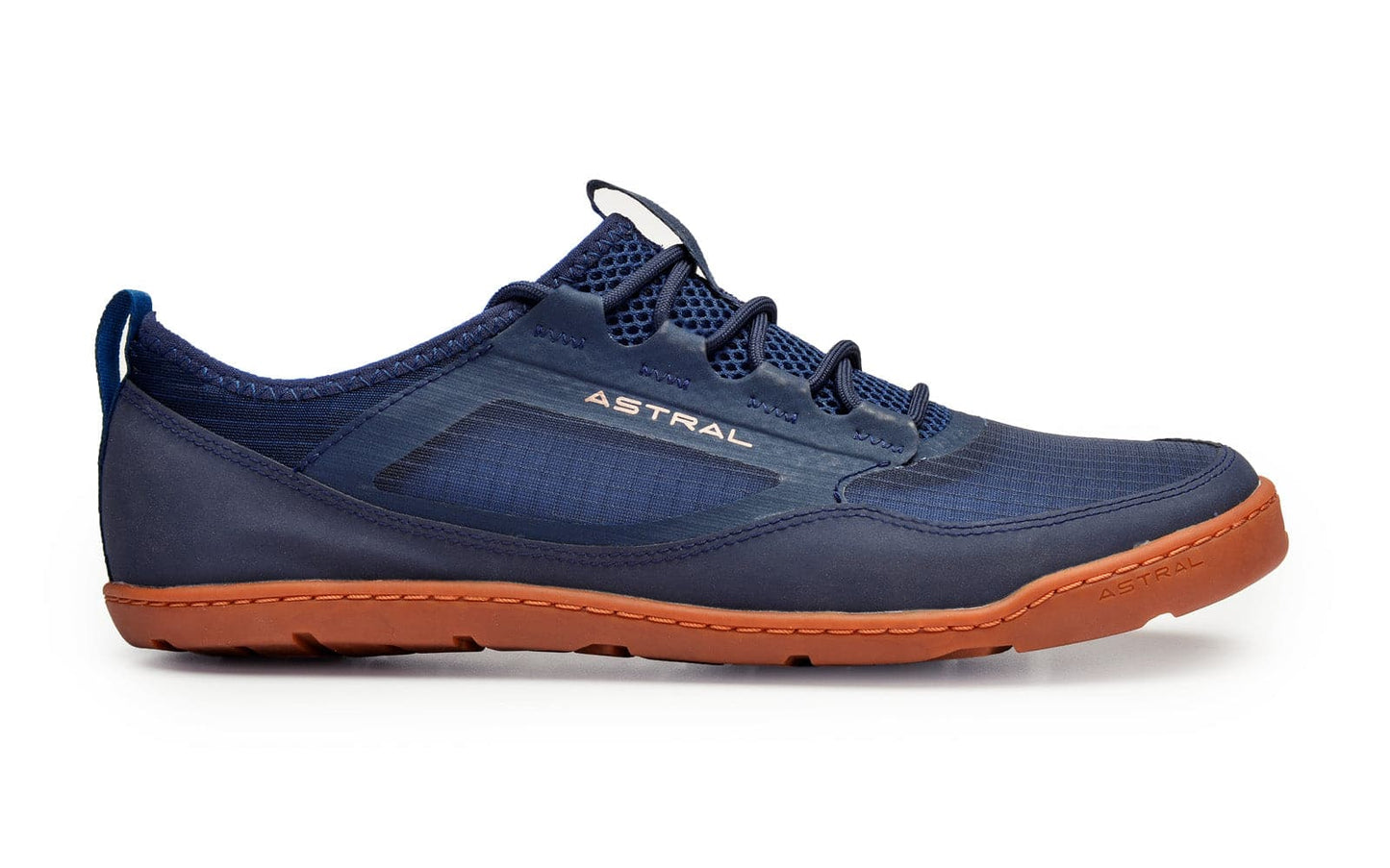 The Loyak AC - Men's by Astral is a navy blue sneaker with a durable ripstop mesh upper and a brown sole. It features laces, the "Astral" brand name on the side, and offers style and stability with its G-Rubber outsoles.