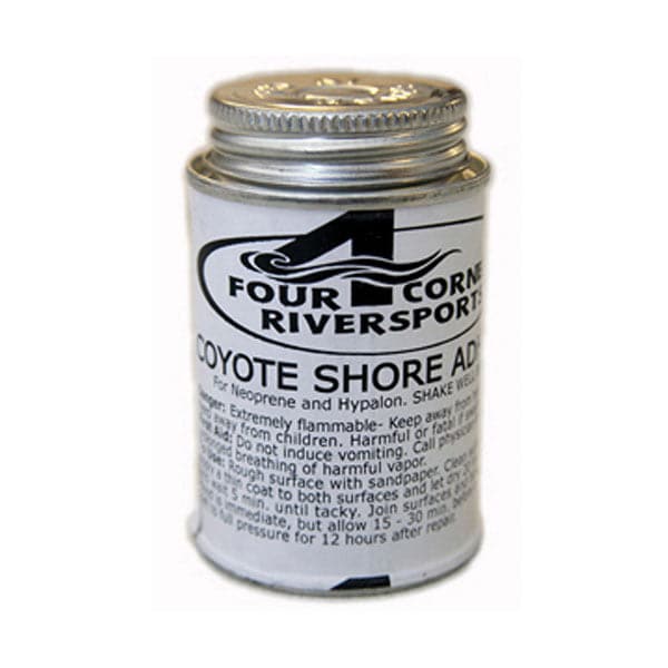 A small metal can labeled "Shore Adhesive for Hypalon" with safety instructions, ideal for neoprene and Hypalon applications. It features a screw-on lid and is branded by "Coyote River Gear," ensuring durable bonding in all your water sport adventures.