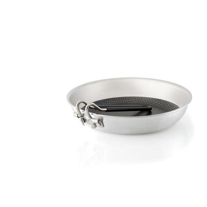 The Gourmet Fry Pan - 8 in. by GSI Outdoors is an 8" stainless steel frying pan with a black, honeycomb-textured nonstick surface and a SureLock handle for secure grip.