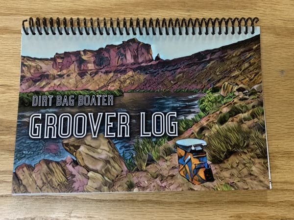 Featuring the Groover Log book, gift for kid, gift for rafter, guide book manufactured by 4CRS shown here from one angle.