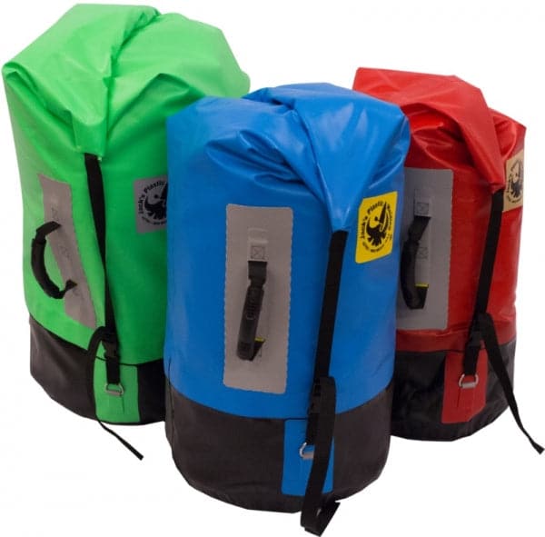 Explore Jacks Plastic Welding's Outfitter Dry Bag, crafted with welded 18oz PVC. These waterproof bags, in green, blue, and red, have roll-top closures and durable black bases. Perfectly built for adventure with a polyethylene stiffener for enhanced performance and reliability.