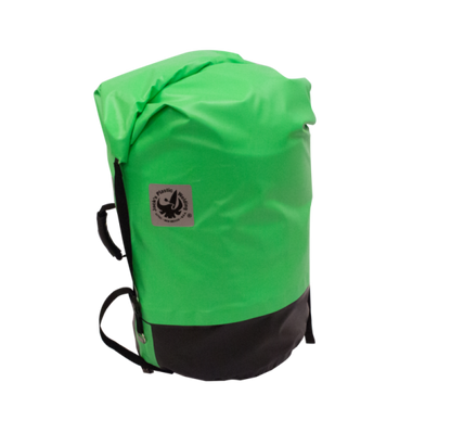 A green and black Outfitter Dry Bag by Jacks Plastic Welding, featuring a roll-top closure, front logo, and durable rugged welded 18oz PVC construction.