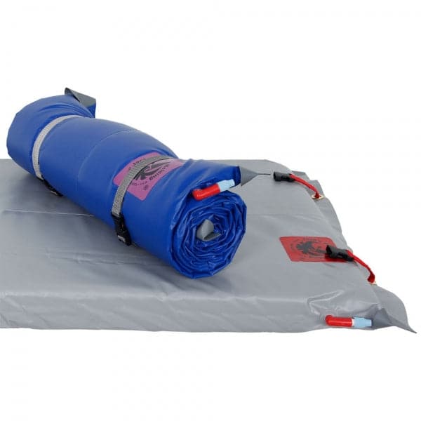 A rolled-up Super Paco Pad in blue, made from waterproof PVC by Jacks Plastic Welding, with a partially unrolled gray section featuring straps and red valves.