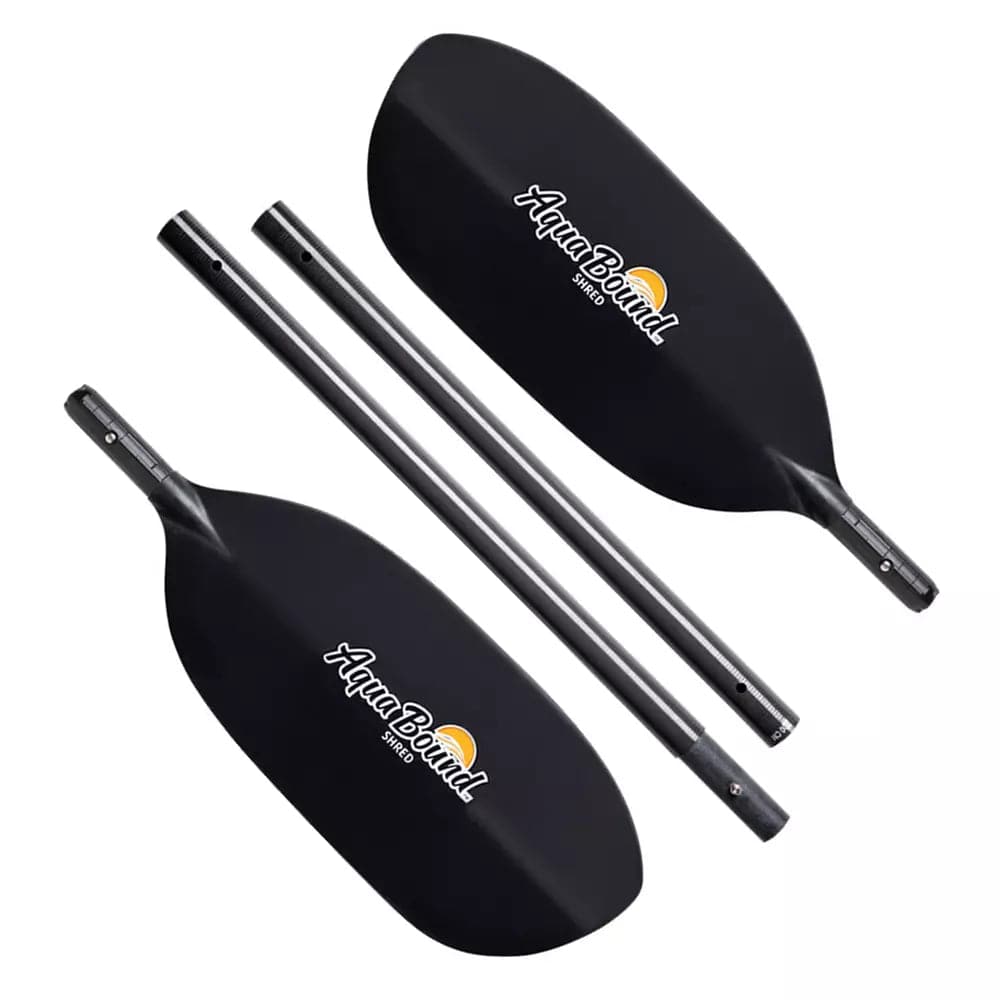 Featuring the Shred 4-Piece Paddle breakdown paddle, carbon fiber whitewater paddle, entry level whitewater paddle, fiberglass whitewater paddle, hand paddle, ik paddle, pack raft paddle, travel paddle manufactured by AquaBound shown here from one angle.