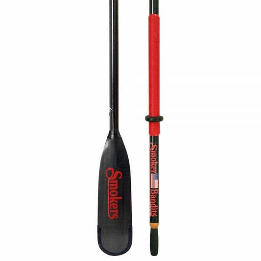 A black and red "Smoker Bandit Oar" by Sawyer, featuring interchangeable blades, a textured grip, and a labeled blade.