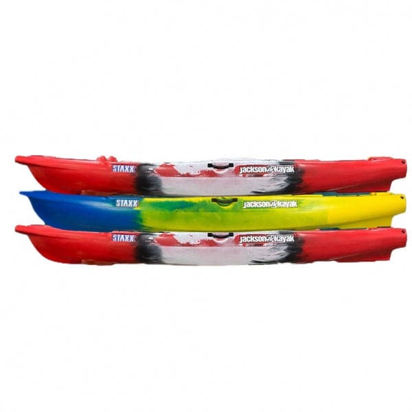 Three Jackson Staxx 10'8 kayaks on a white background.