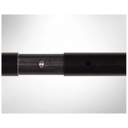 Close-up of the Werner Paddles Tybee 4-Piece Paddle's black telescopic pole with adjustable ferrule and metal joint on a light gray background, evoking the reliable design of a fiberglass shaft in a premium kayak paddle.