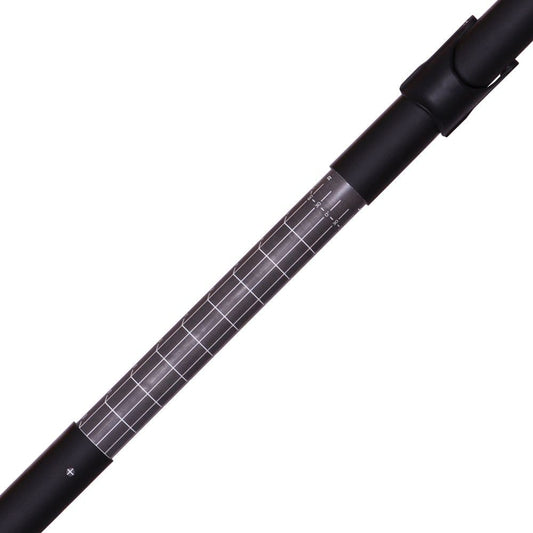A close-up of the Werner Paddles' Skagit FG Adjustable Paddle shows its telescopic pole with a measurement scale in a partially extended position against a white background, highlighting the precision of its fiberglass reinforced nylon shaft.