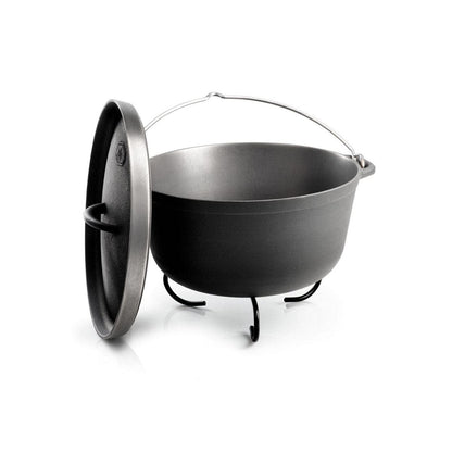 A black GSI Outdoors Guidecast Dutch Oven, corrosion-resistant and with three legs and a handle, is paired perfectly with its matching lid set alongside.