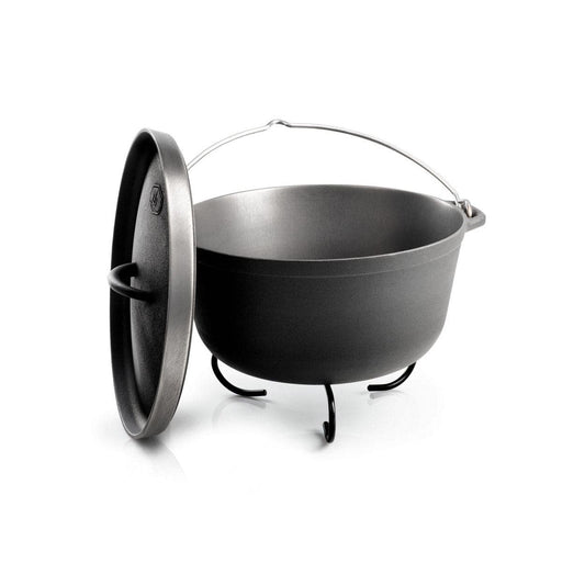 A black GSI Outdoors Guidecast Dutch Oven, corrosion-resistant and with three legs and a handle, is paired perfectly with its matching lid set alongside.