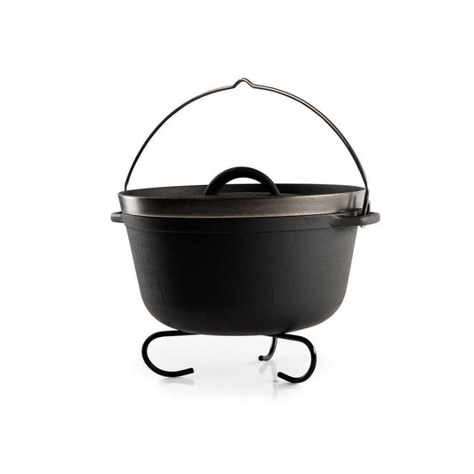 The Guidecast Dutch Oven by GSI Outdoors is a corrosion-resistant black cast iron pot with a lid, handle, and sits elegantly on a three-legged stand.