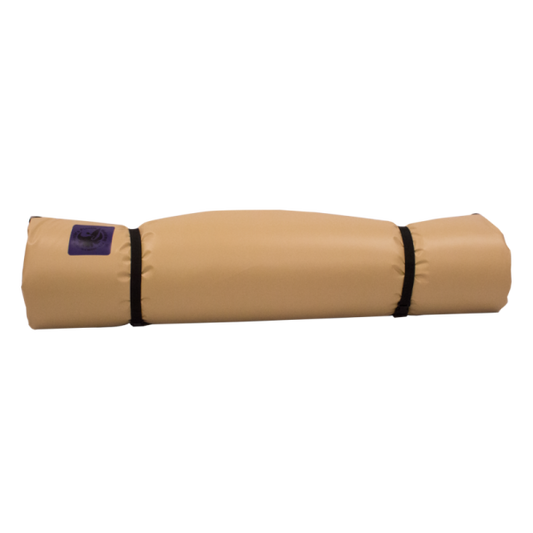 The Pickup Paco Pad by Jacks Plastic Welding, a beige, self-inflating sleeping bag, is neatly rolled and secured with two black straps against a white background.