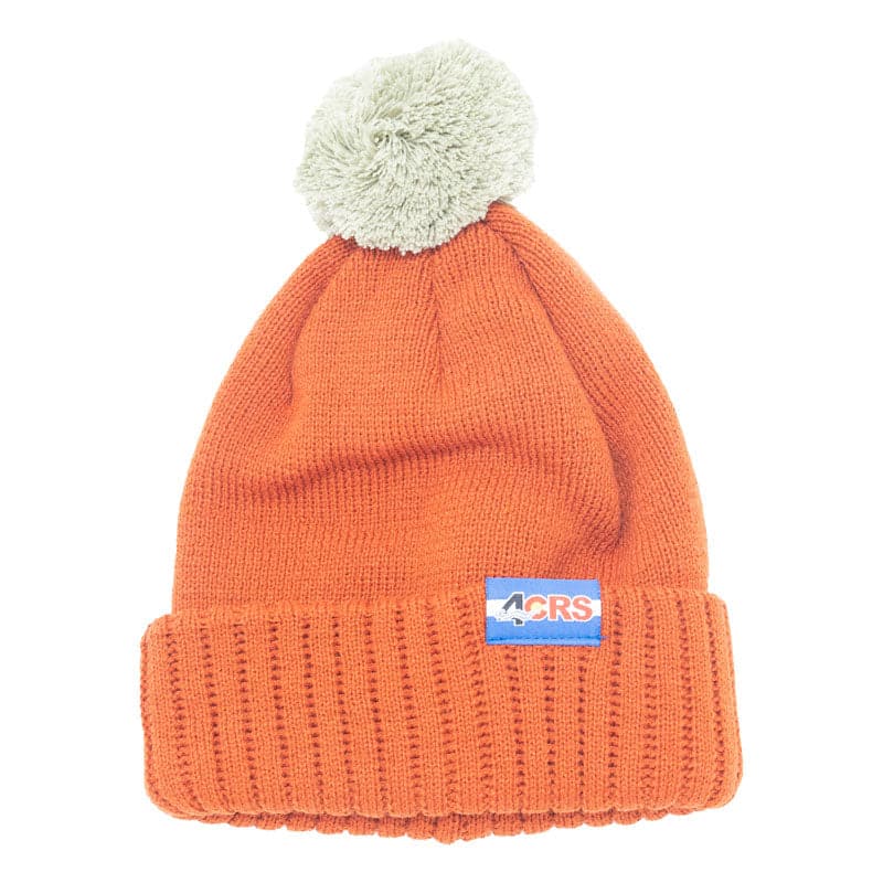 Featuring the 4CRS Pom Pom Beanie 4crs logo wear manufactured by 4CRS shown here from a third angle.